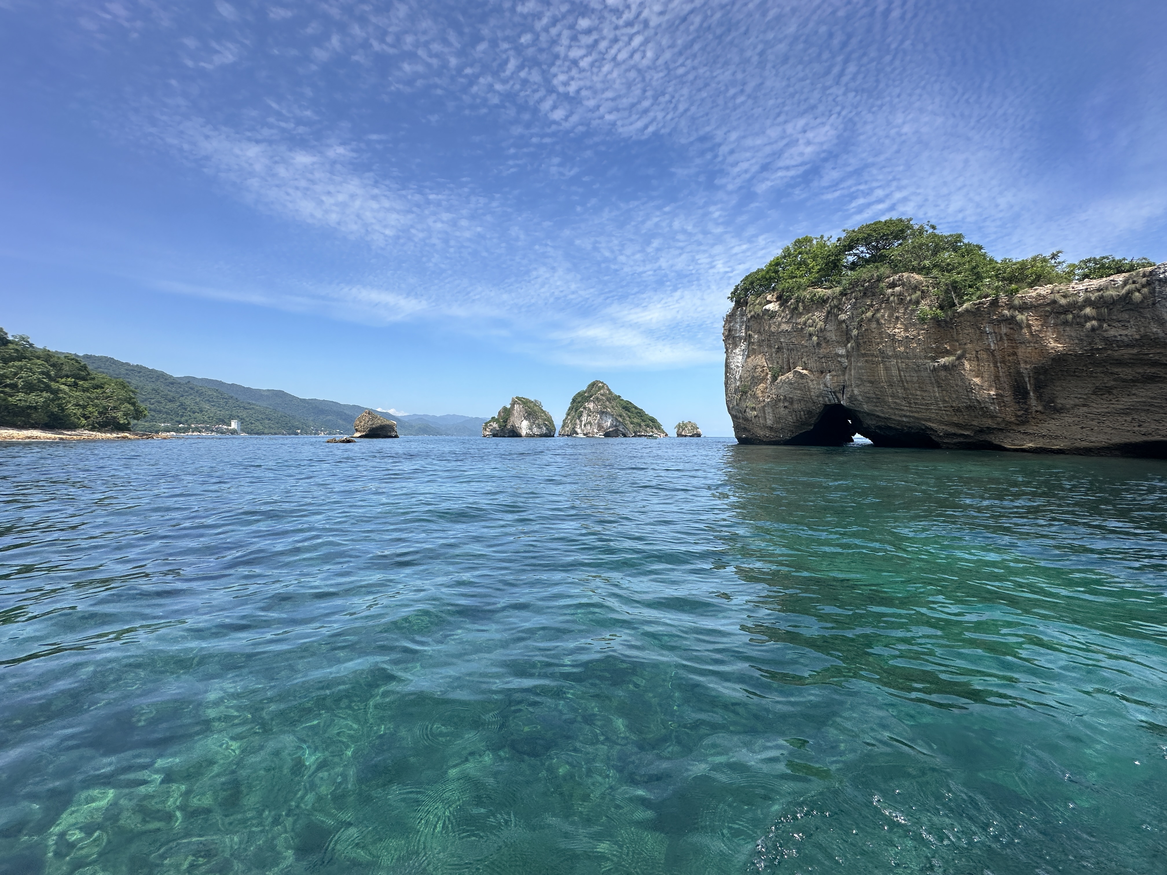 Los Arcos, Puerto Vallarta — clear water and the sea arches